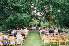The Oak Arbour set up for an outdoor ceremony with chairs set out on the lawn