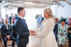 Exchanging vows in the wedding barn