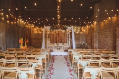 Kejal & Matt ensured they represented both their heritages by having a fabulous fusion rustic Indian country wedding at The Green in Cornwall. This imageos of a mandap set up in the Really Rustic Barn.