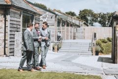 Kieran and his groomsmen sharing a joke before the ceremony