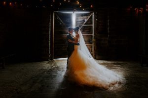 Couple in Really Rustic Barn